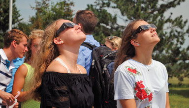 Girls observe solar eclipse